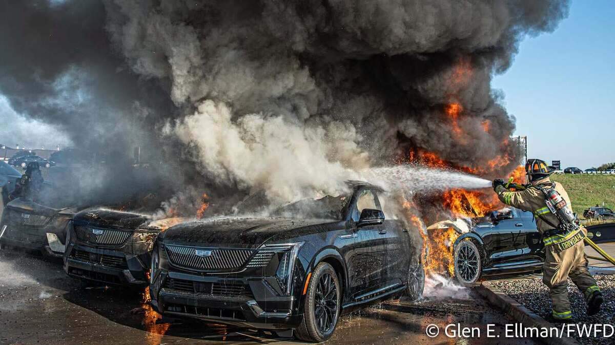 Fort Worth firefighters battled for almost 18 hours after six electric SUVs were destroyed and two others damaged in a fire at a Cadillac dealership on Friday. Fort Worth firefighters battled for almost 18 hours after six electric SUVs were destroyed and two others damaged in a fire at a Cadillac dealership on Friday.